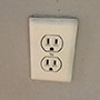 New homeowner found a receptacle that didn't work. Turns out it was a false plug with a stash box attached